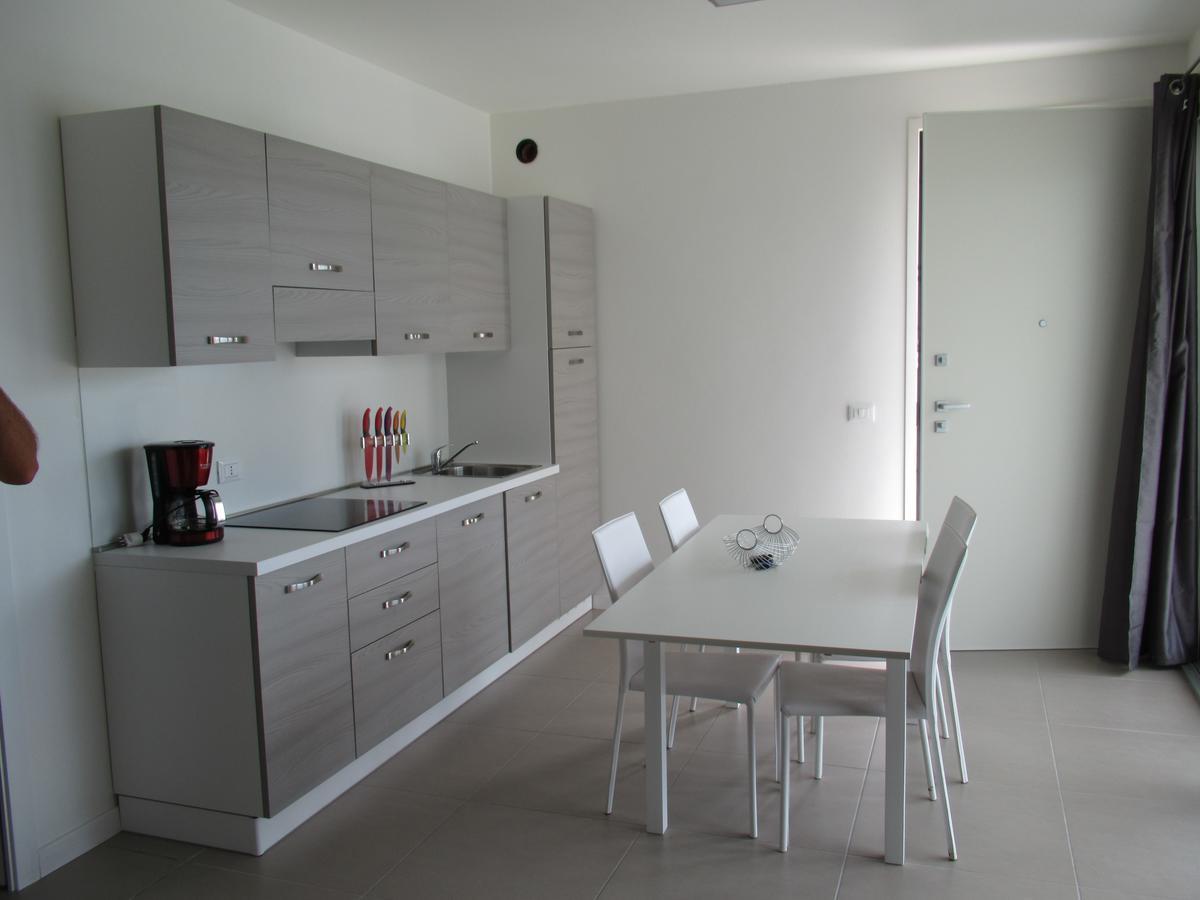 Appartment Sunset ลิโดดิเยโซโล ภายนอก รูปภาพ