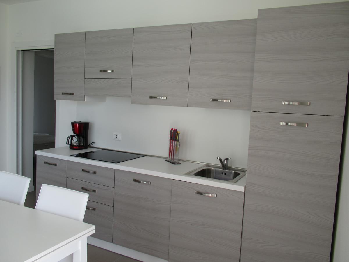 Appartment Sunset ลิโดดิเยโซโล ภายนอก รูปภาพ