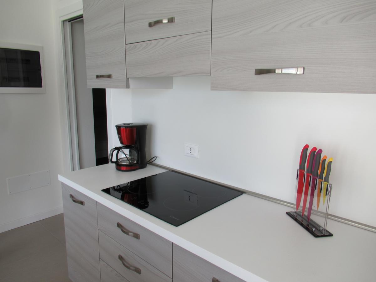 Appartment Sunset ลิโดดิเยโซโล ภายนอก รูปภาพ
